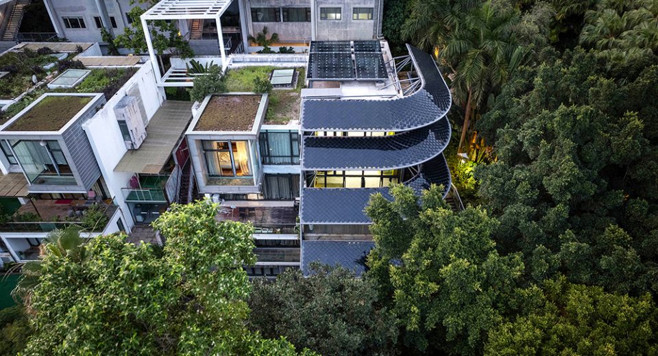 Positive Energy House Shenzhen exterior showing sweeping curved solar roofs integrated into architecture